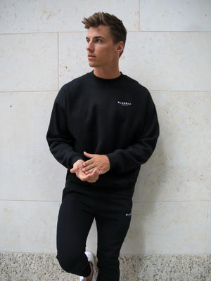 Universal Relaxed Jumper - Black