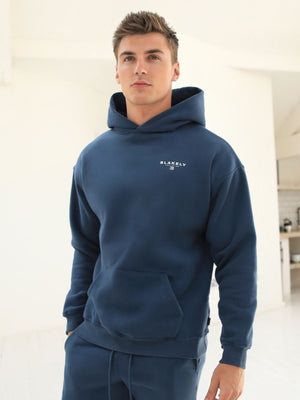 Riviera Initial Relaxed Hoodie - Mid Blue