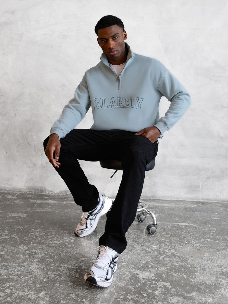 Outline Varsity 1/4 Zip Up Jumper - Mineral Blue