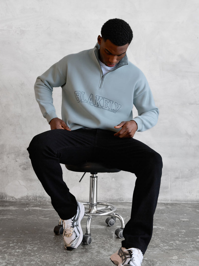 Outline Varsity 1/4 Zip Up Jumper - Mineral Blue